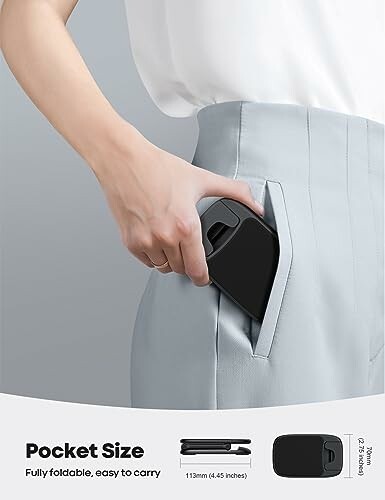 Person placing a foldable phone in a pocket